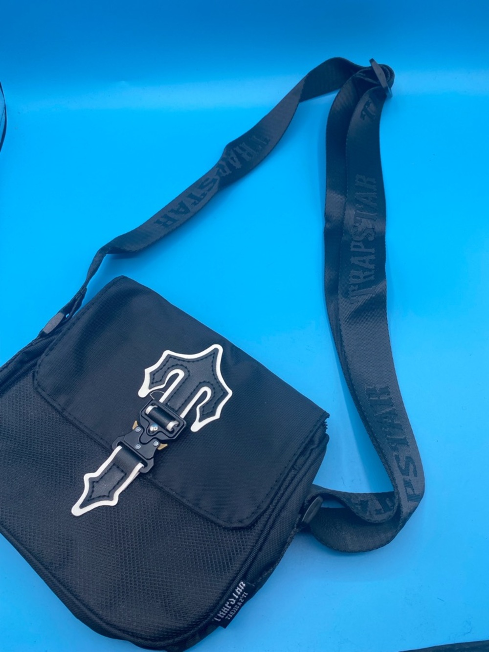 Trapstar Black Messenger Bag with Decorative Cross Buckle